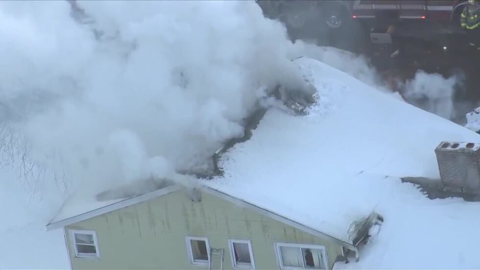 A man using a torch to melt an ice dam accidentally set his Boston-area home on fire.