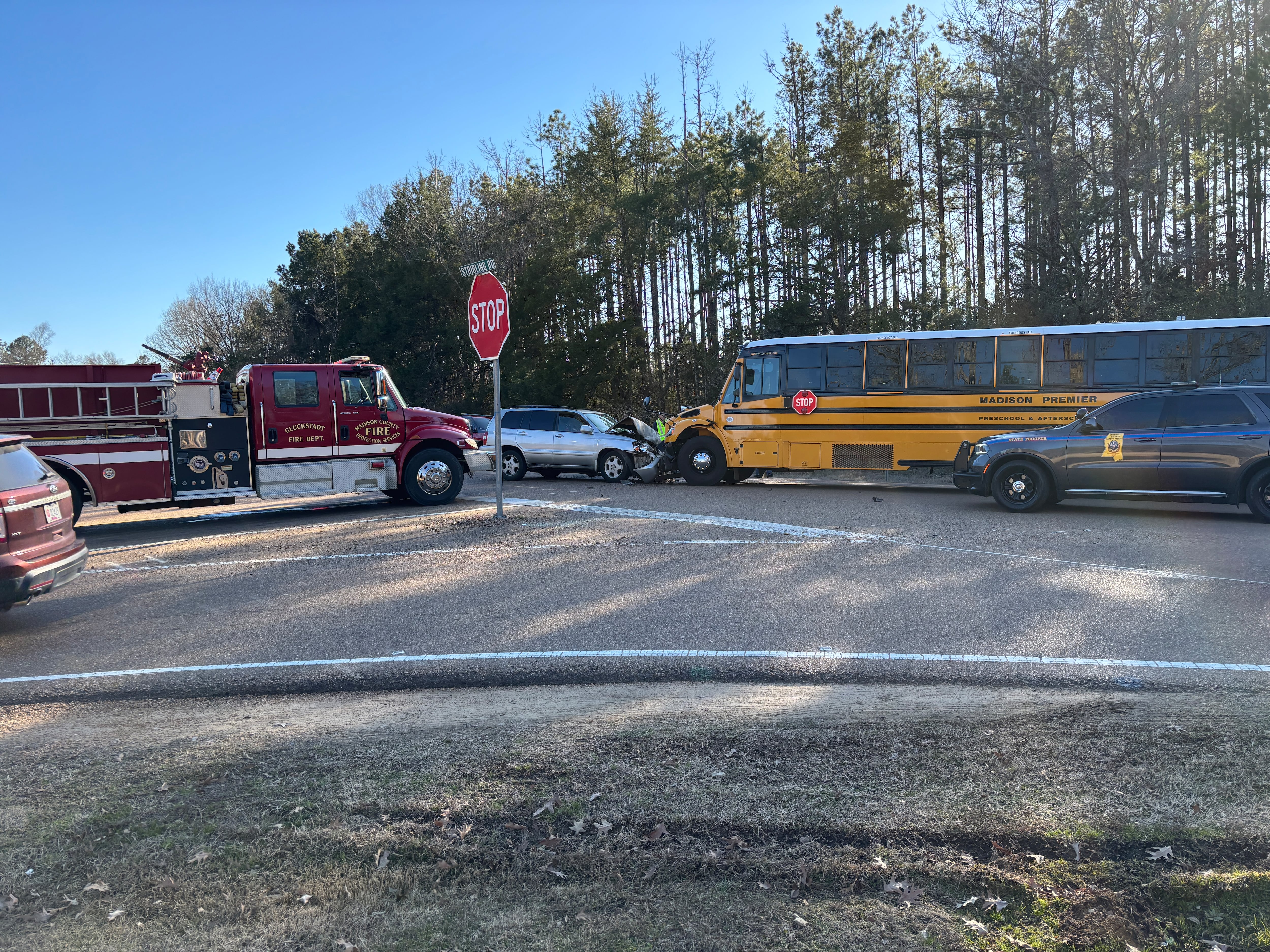 Three taken to hospital after school bus and SUV collide in Madison County