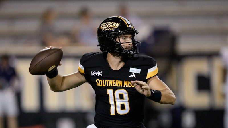 Southern Mississippi quarterback Landry Lyddy (18) throws during an NCAA college football game...