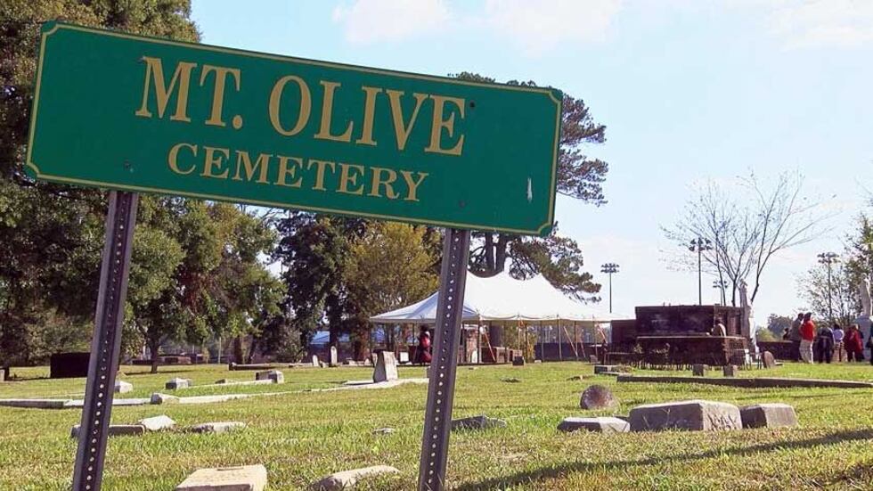 Overgrown gravestones at Mt. Olive Cemetery